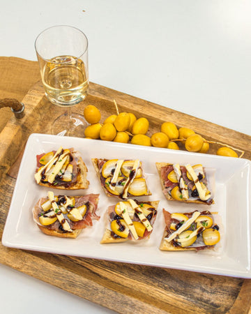Yellow Barhi Prosciutto & Brie Toasts Recipe
